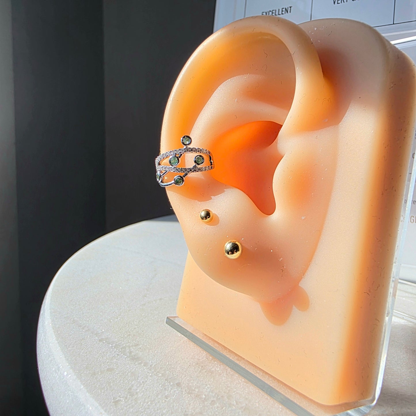 Bevelled Emerald and Diamond Earcuff in 18K White Gold