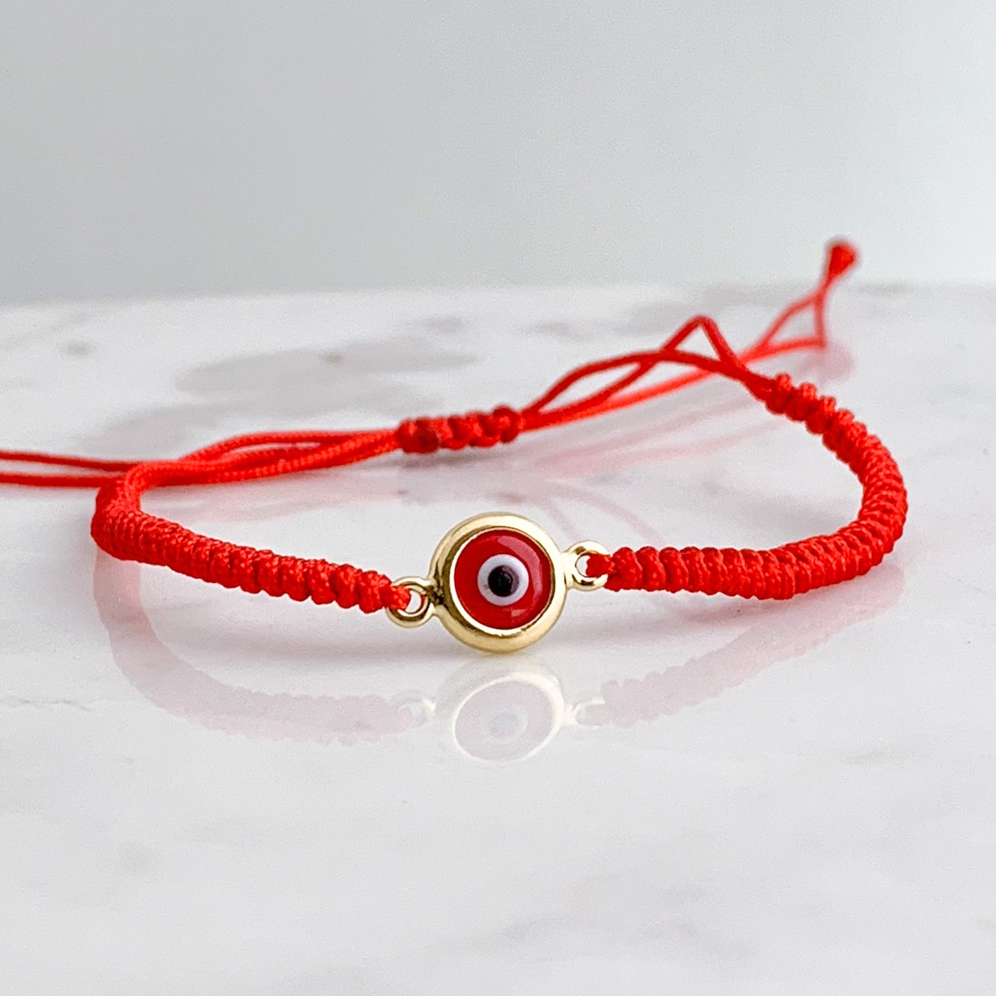 Handwoven Evil Eye Bezel Bracelet in 18K Gold