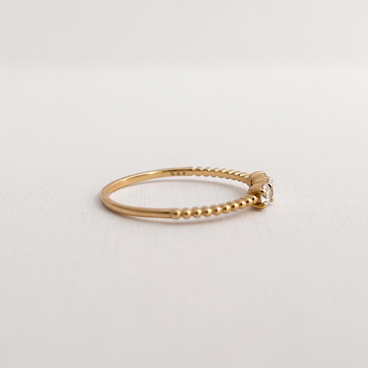 Three Stone Natural Diamond Ring (0.25 ct) in 18K Gold