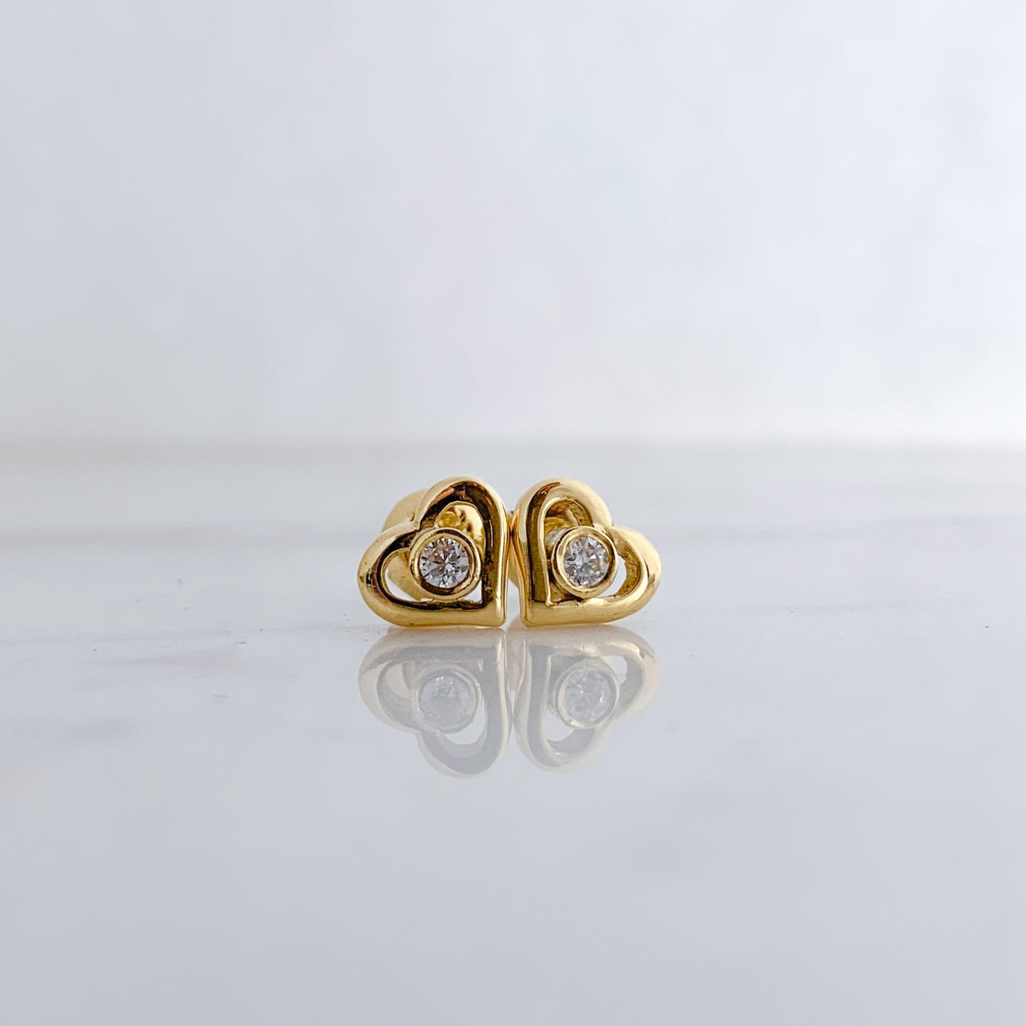 Open Heart Cubic Zirconia Stud Earrings in 18K Gold