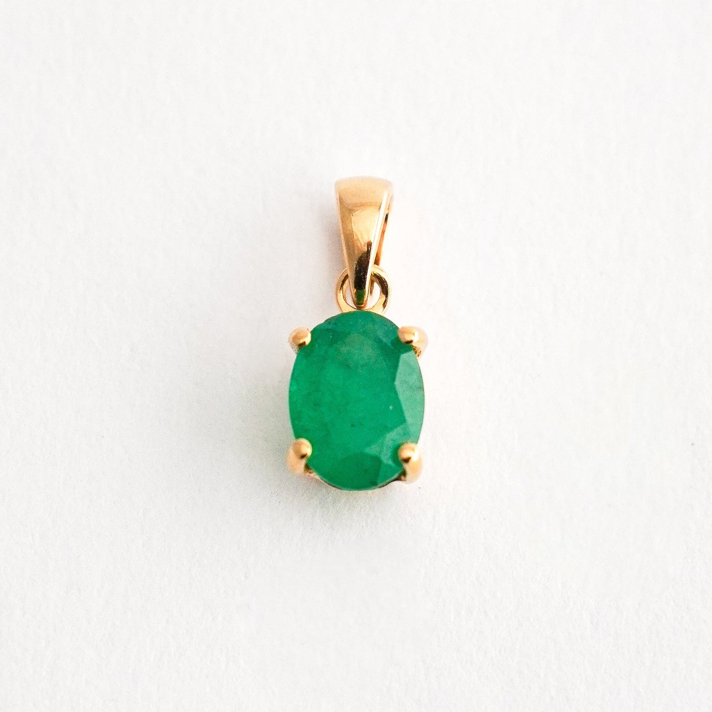 Oval Emerald Solitaire Pendant in 18K Gold